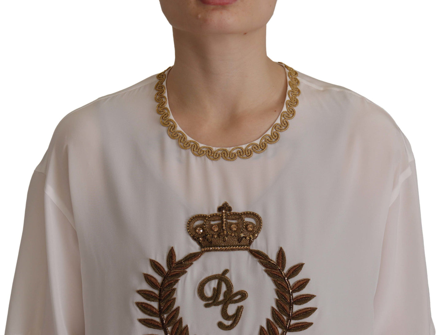 Blusa de seda blanca con cristales y corona DG dorada