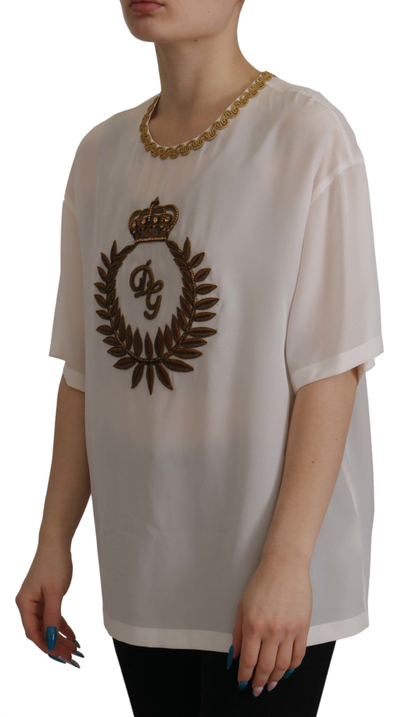 Blusa de seda blanca con cristales y corona DG dorada