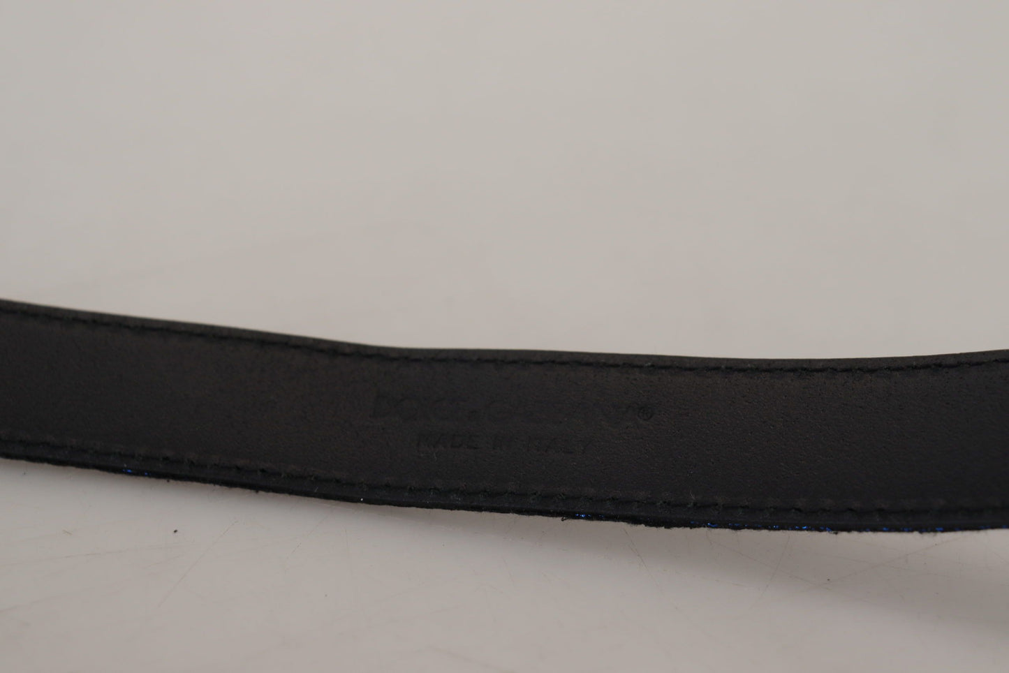 Cinturón con hebilla plateada y rayas de jacquard azul