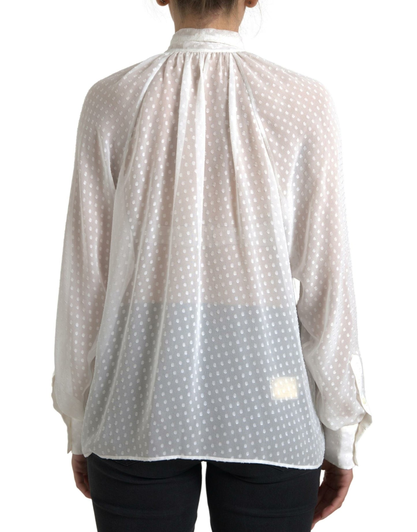 Blusa de lunares con cuello anudado de seda blanca transparente