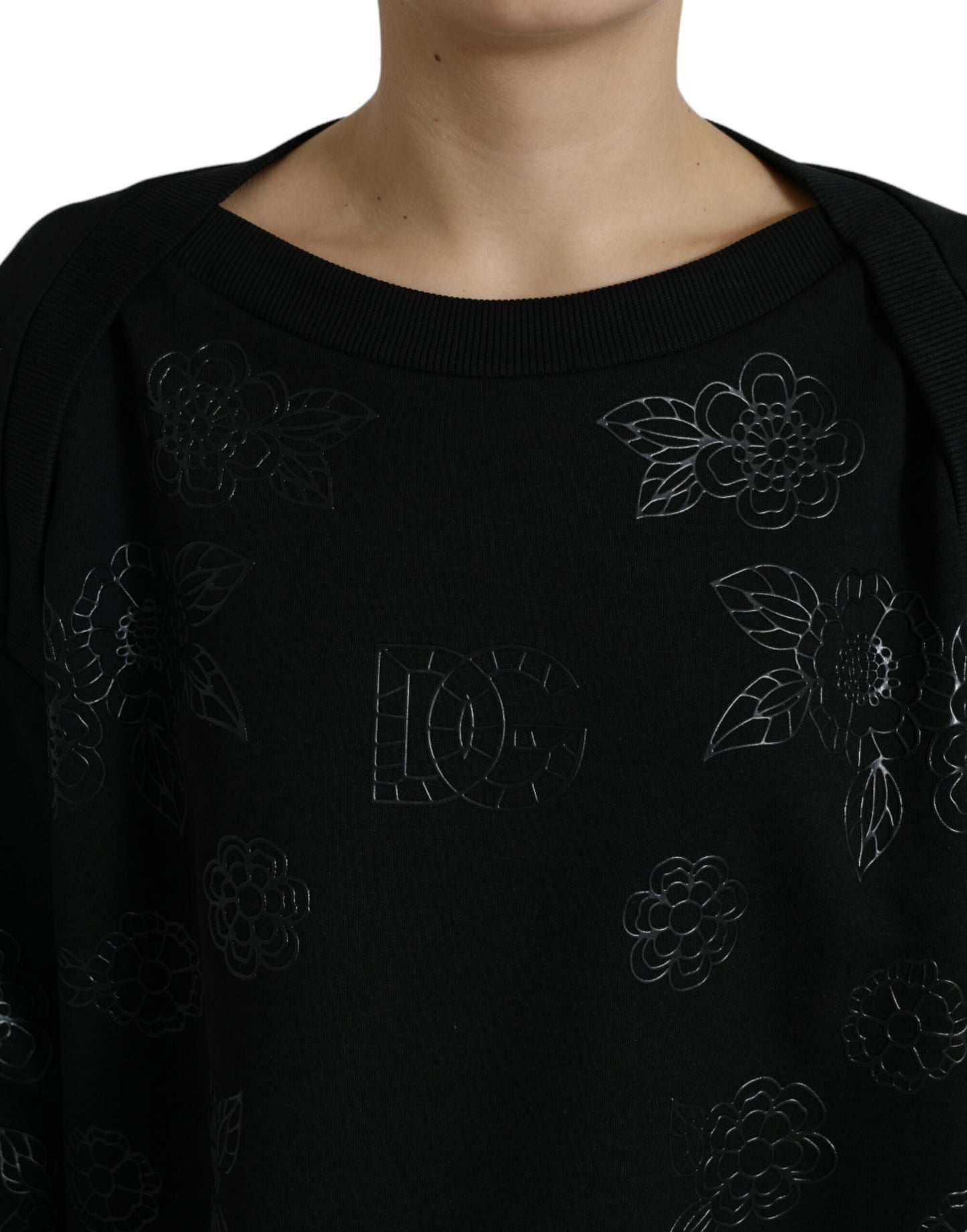 Pull noir avec logo floral appliqué