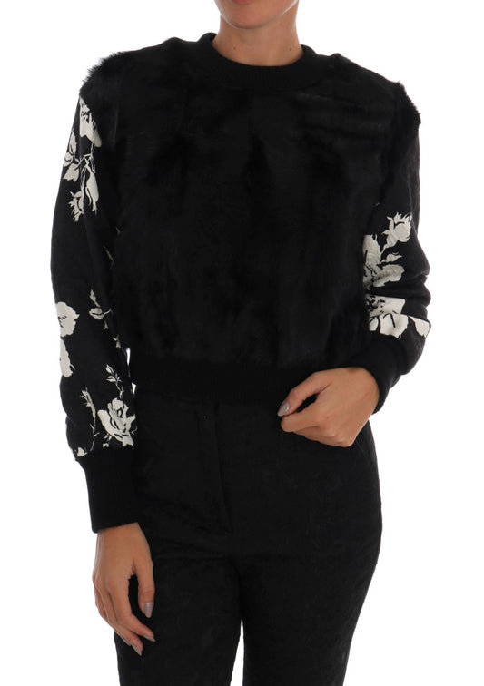 Suéter con cremallera y brocado floral de piel negra