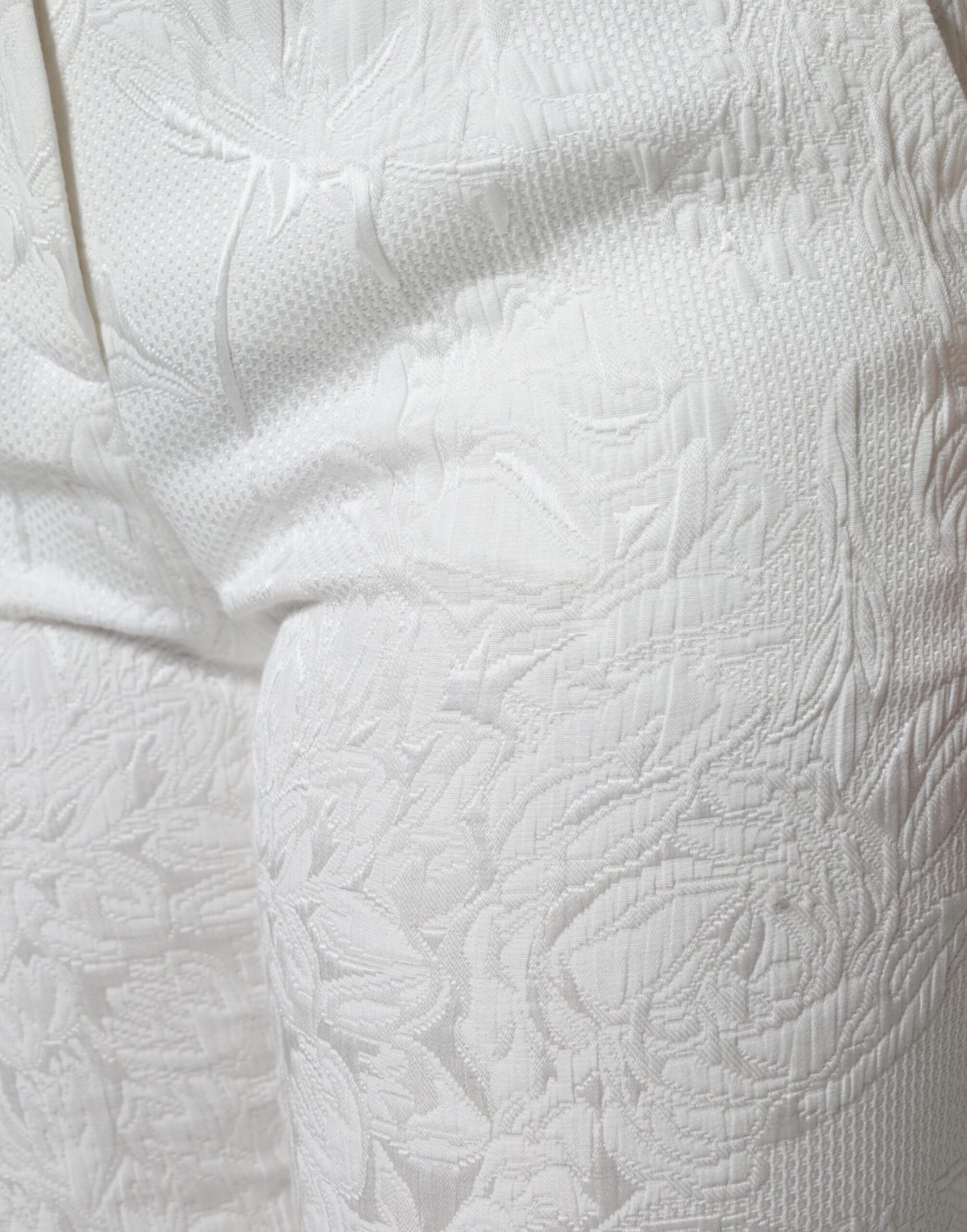 Pantalones cortos de algodón con brocado floral blanco