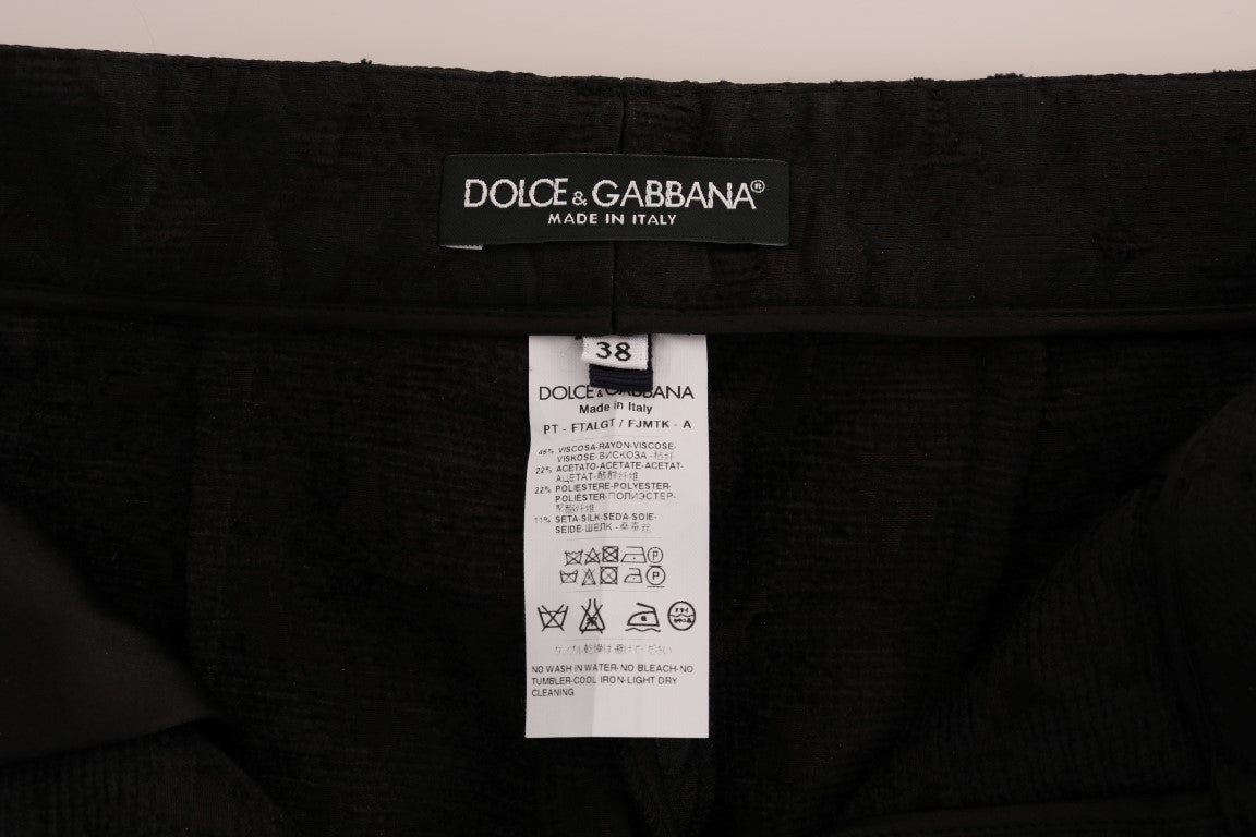 Pantalones capri con brocado floral negro