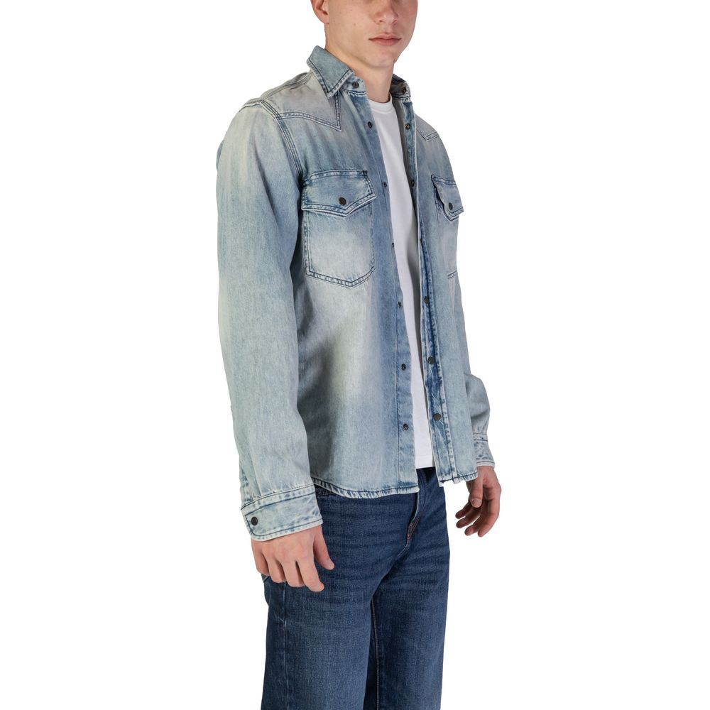 Chemise en coton bleu clair