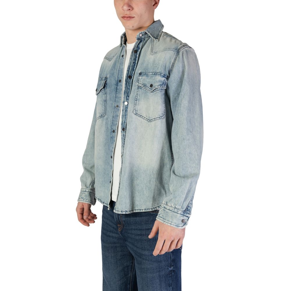 Chemise en coton bleu clair