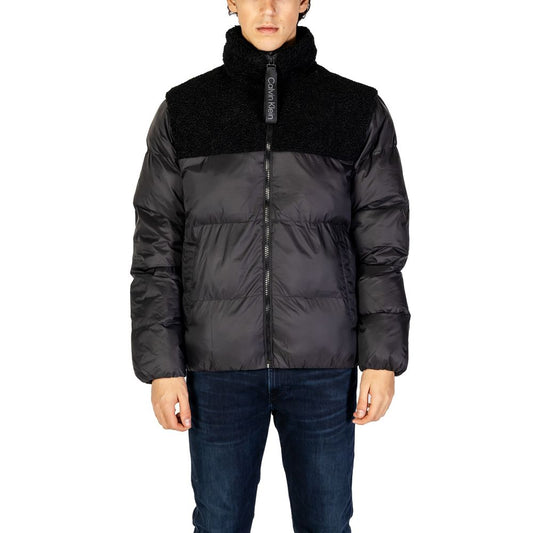 Chaquetas y abrigos de poliéster reciclado negro