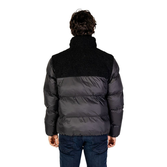 Chaquetas y abrigos de poliéster reciclado negro