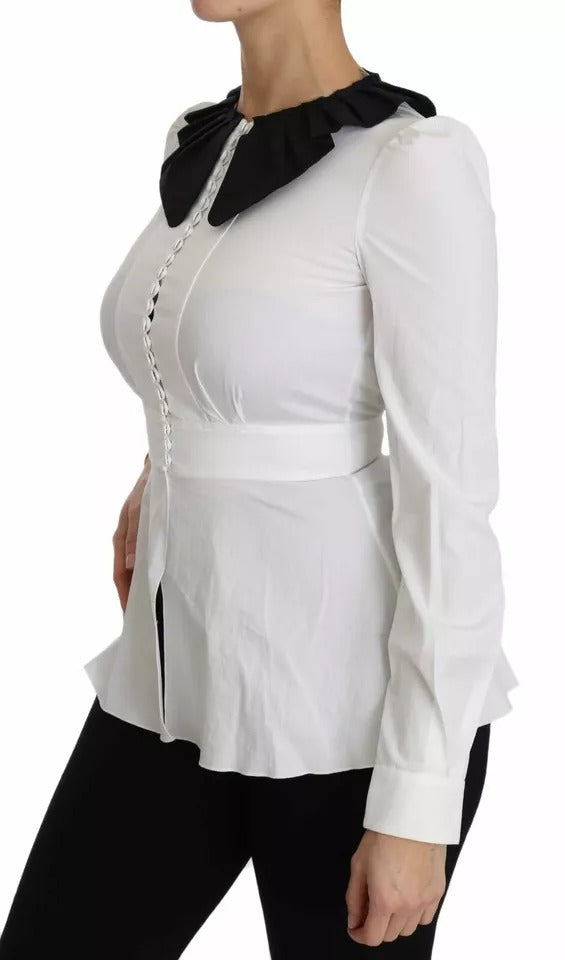 Camisa blusa con botones decorativos en blanco y negro