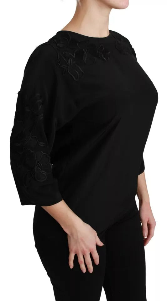 Blusa de seda negra con bordado floral