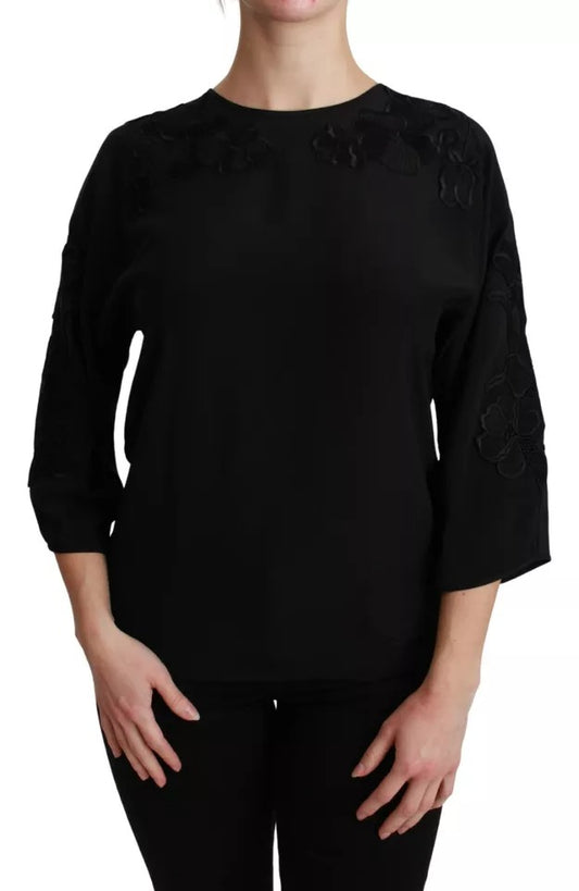 Blusa de seda negra con bordado floral