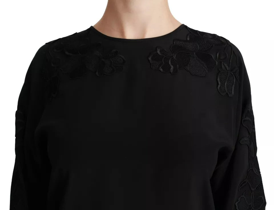 Blusa de seda negra con bordado floral