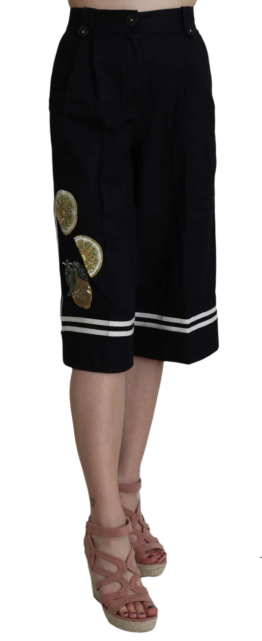 Pantalones negros de algodón con adornos y corte cropped