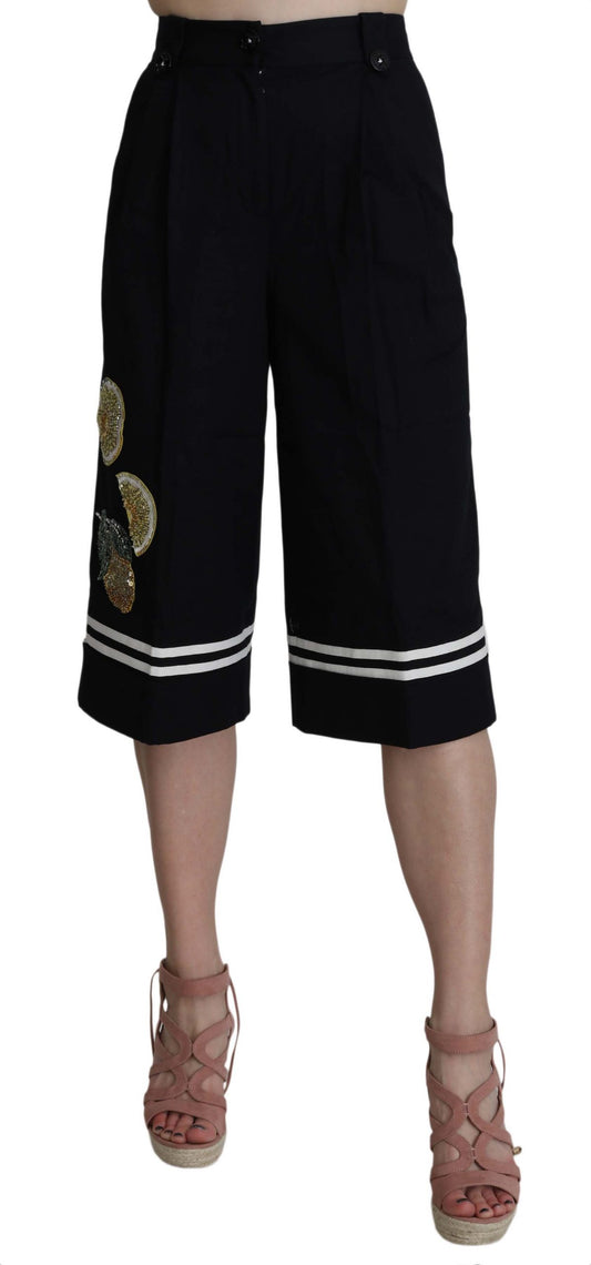 Pantalones negros de algodón con adornos y corte cropped