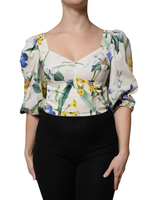 Blusa corta con mangas abullonadas y estampado floral blanco