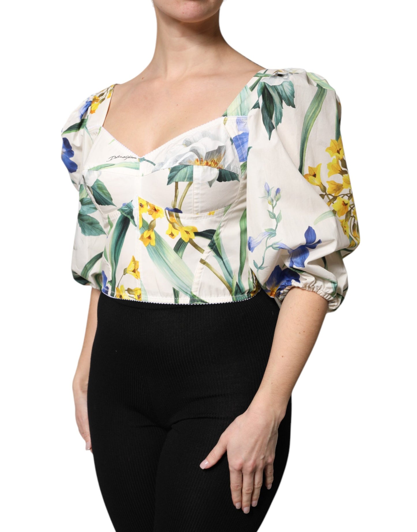 Blusa corta con mangas abullonadas y estampado floral blanco