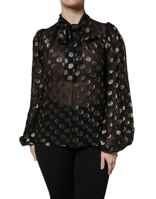 Blusa negra transparente con lunares y cuello anudado