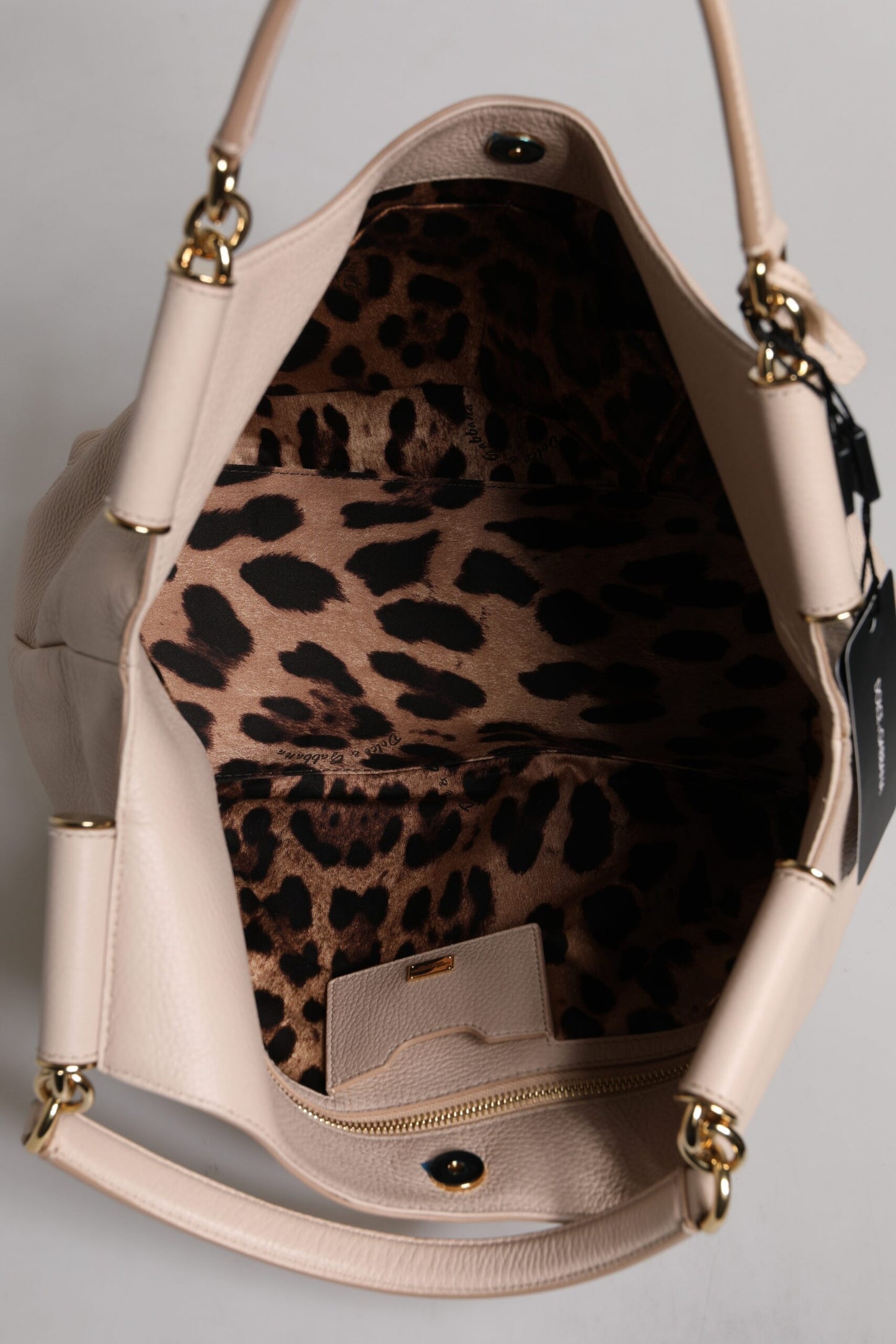 Bolso tote de piel de ciervo rosa claro con placa del logotipo y asa superior