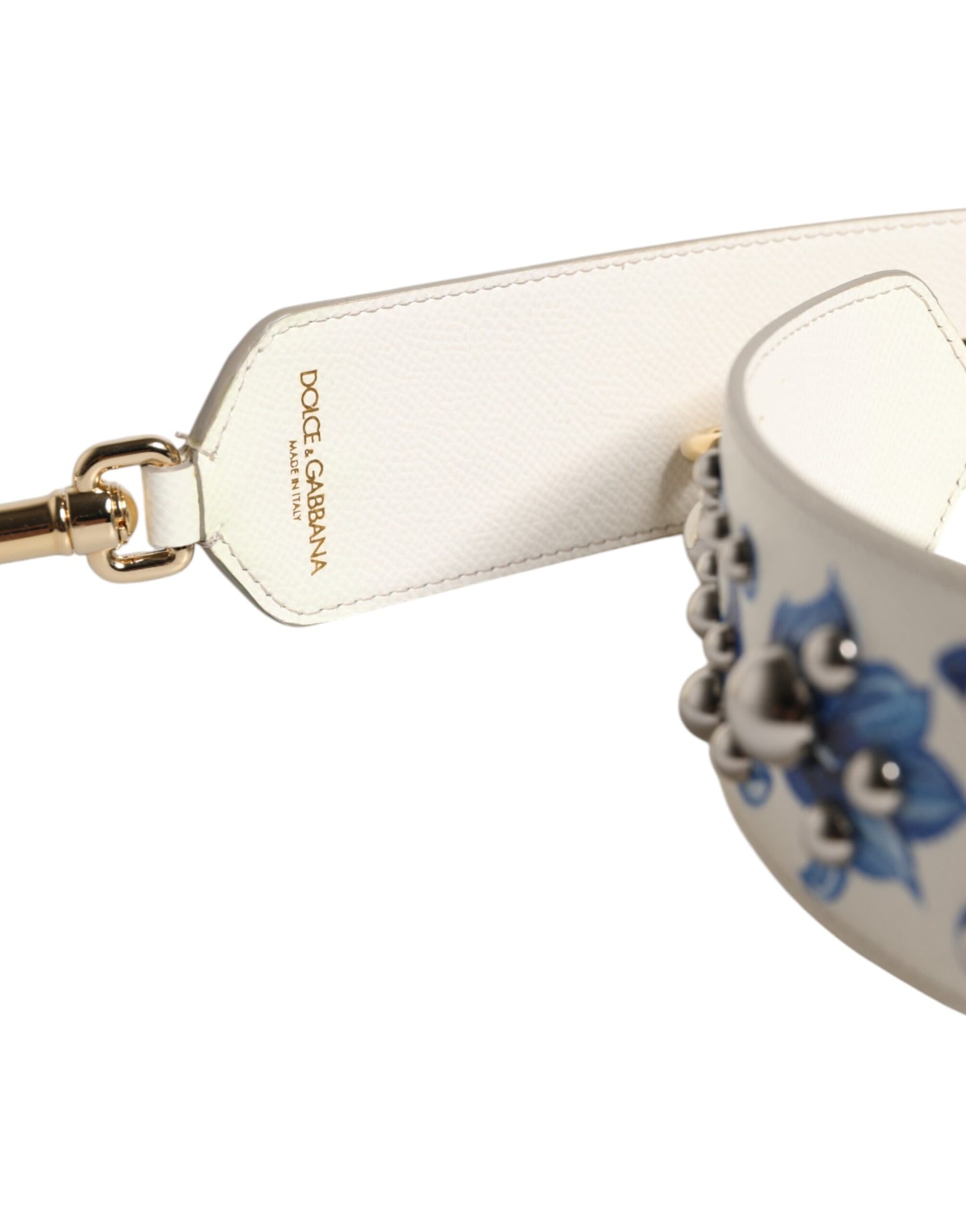 Correa de hombro de cuero con tachuelas y diseño floral blanco y azul