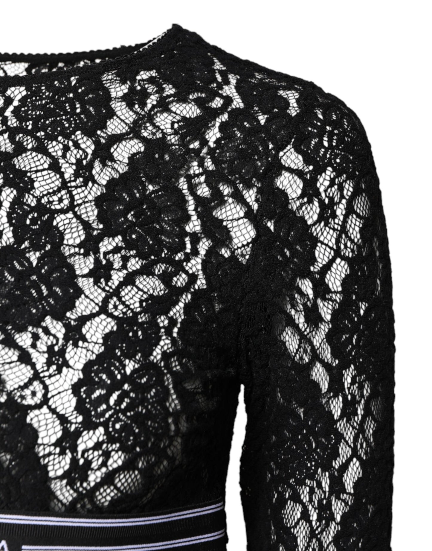 Top tipo jersey de manga larga con encaje floral negro