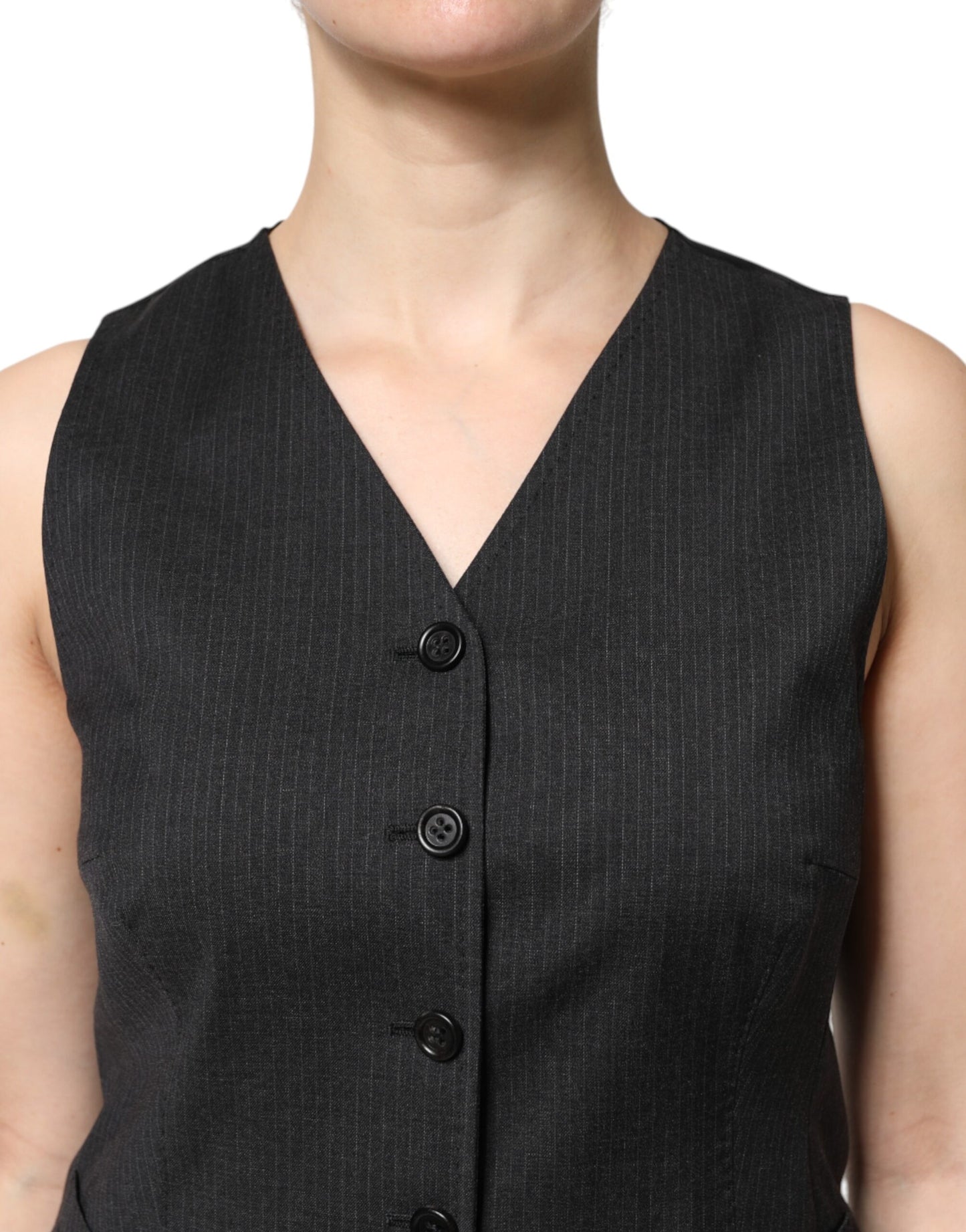 Top sin mangas con botones y rayas negras