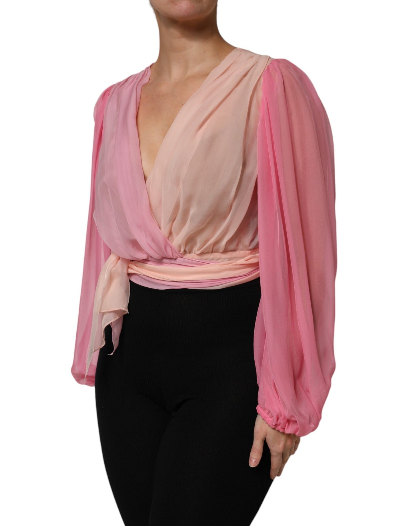 Blusa rosa de manga larga con escote en V pronunciado