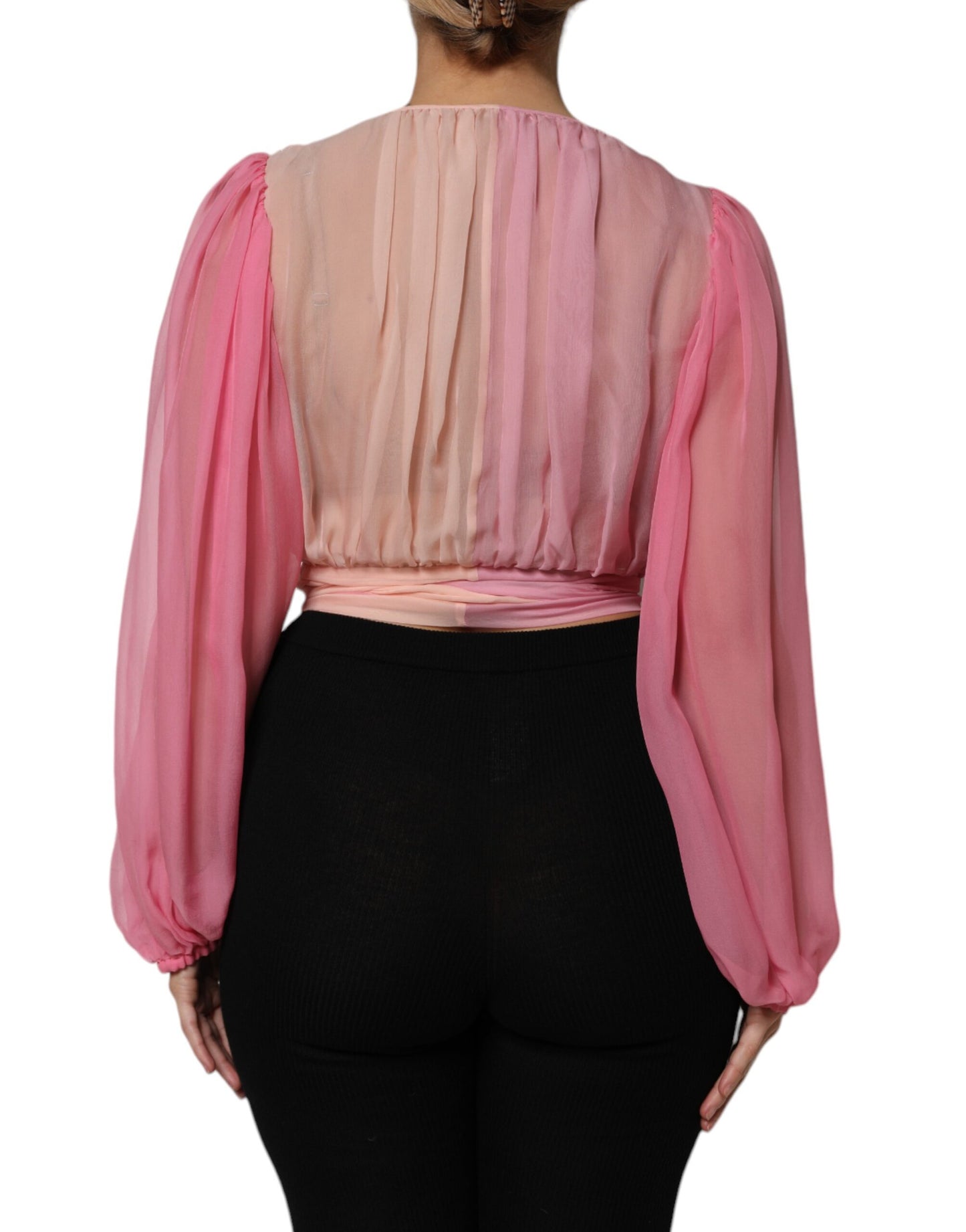 Blusa rosa de manga larga con escote en V pronunciado