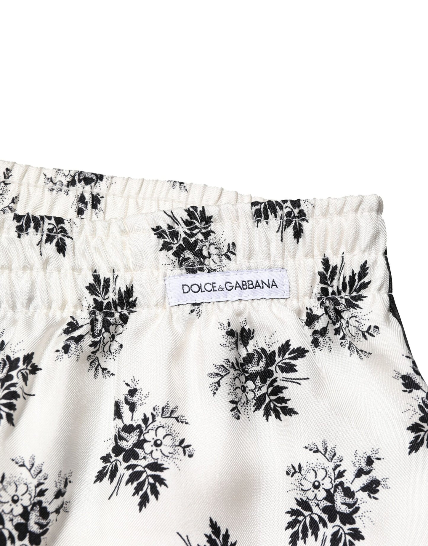 Pantalones casuales de seda con estampado floral blanco