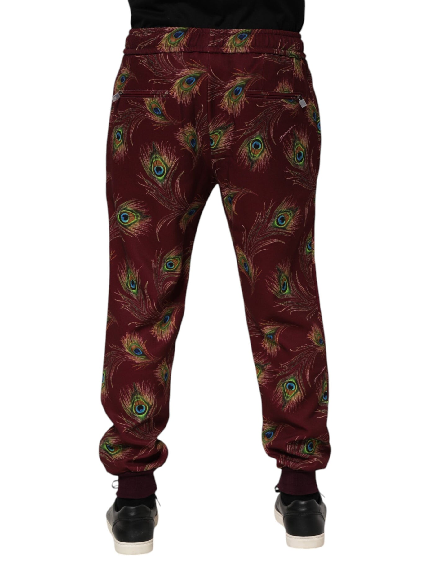 Pantalones deportivos con estampado de plumas de pavo real color burdeos