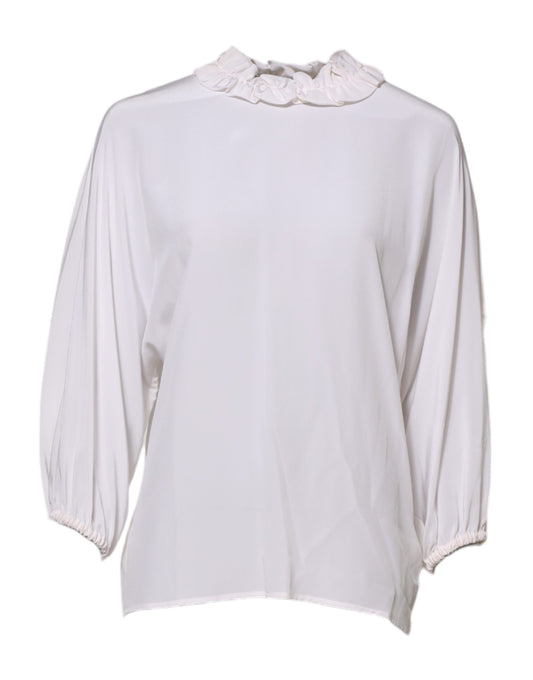 Blusa blanca con escote fruncido y volantes