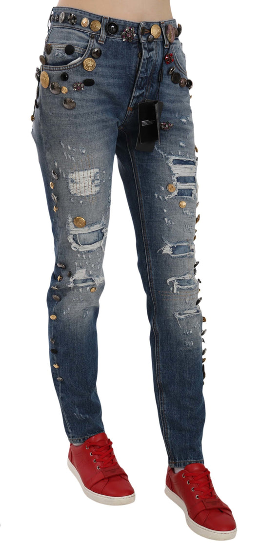 Pantalones vaqueros desgastados con botones adornados