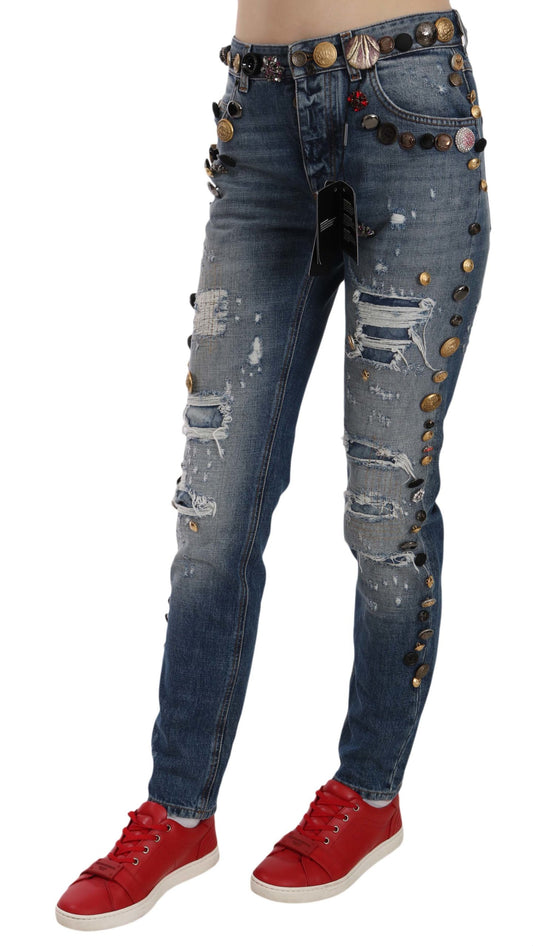 Pantalones vaqueros desgastados con botones adornados