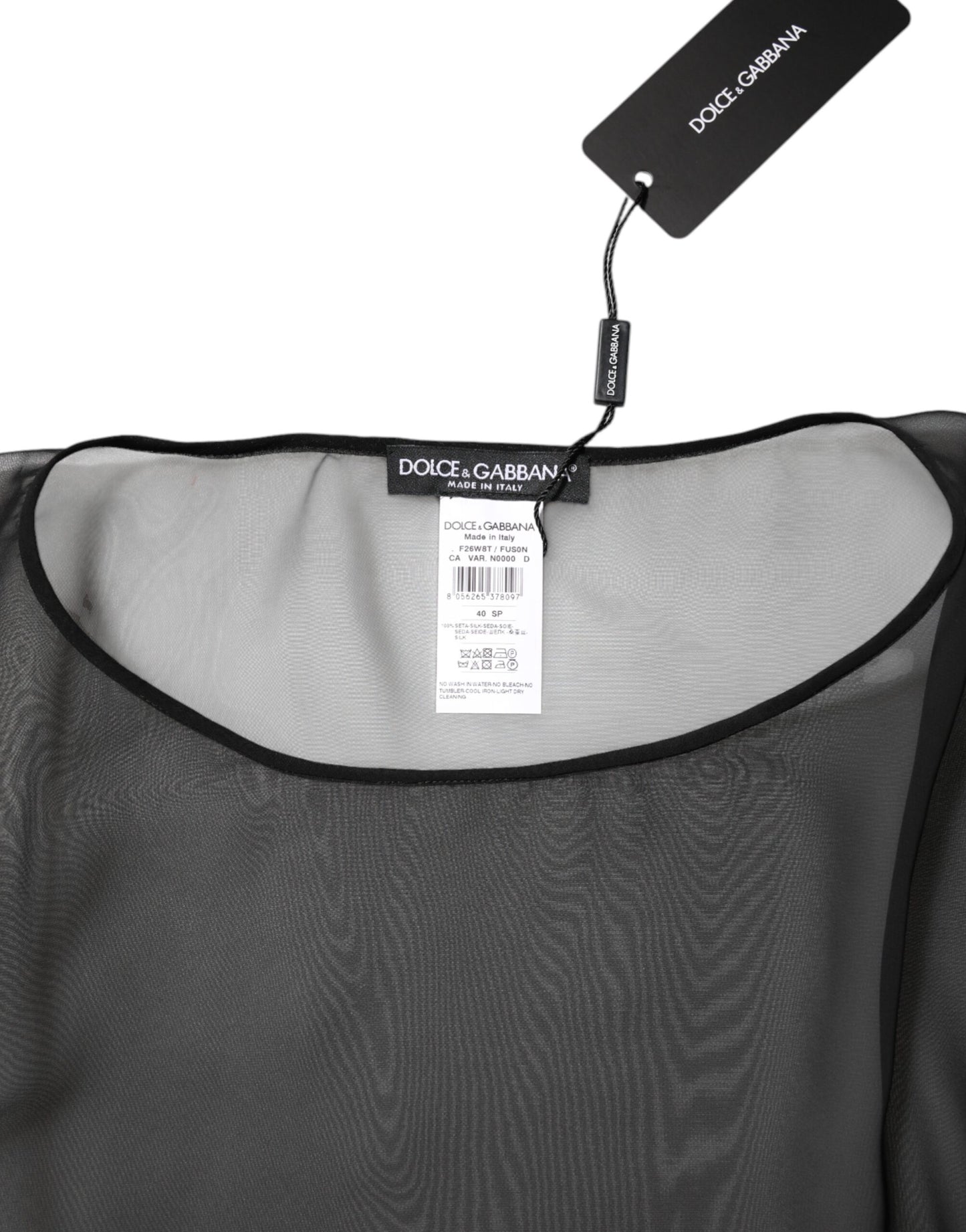 Blusa de gasa de seda negra transparente con encaje