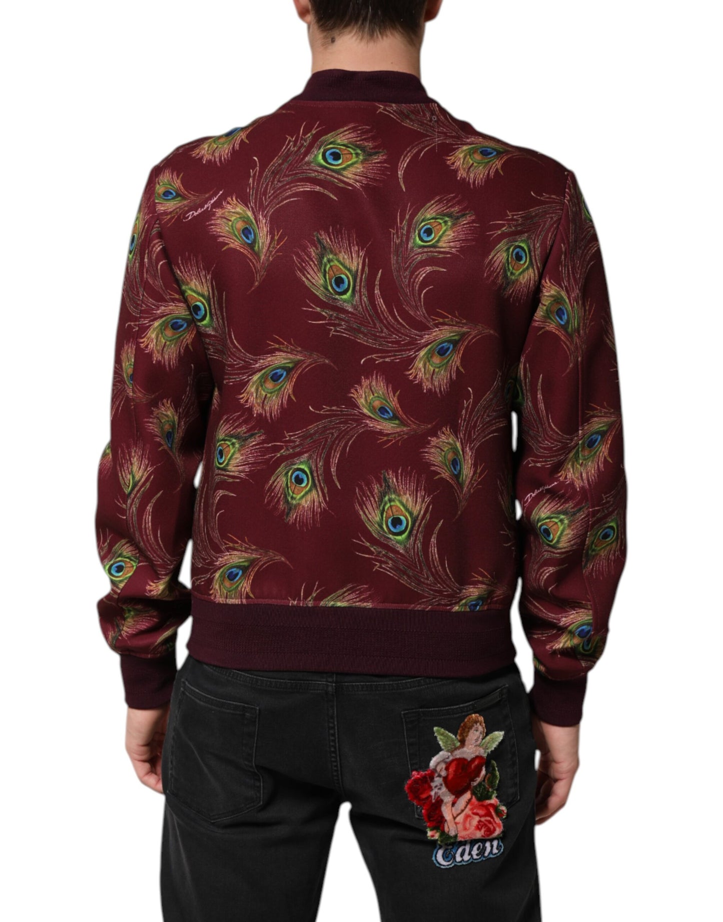 Chaqueta bomber con estampado de plumas de pavo real en color granate