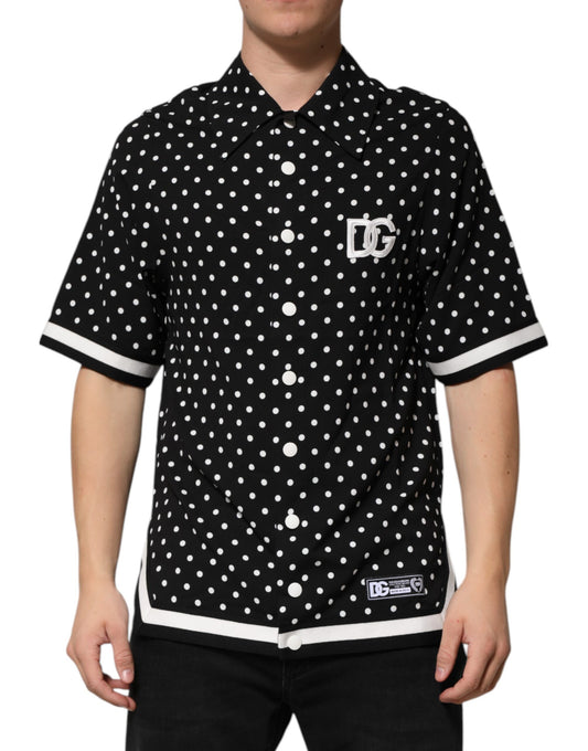 Camiseta polo de manga corta con cuello y lunares negros