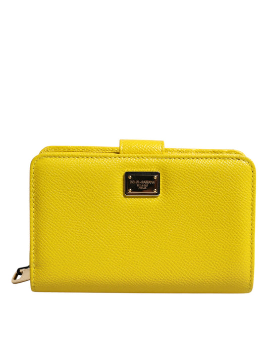 Cartera de mano continental plegable de cuero amarillo