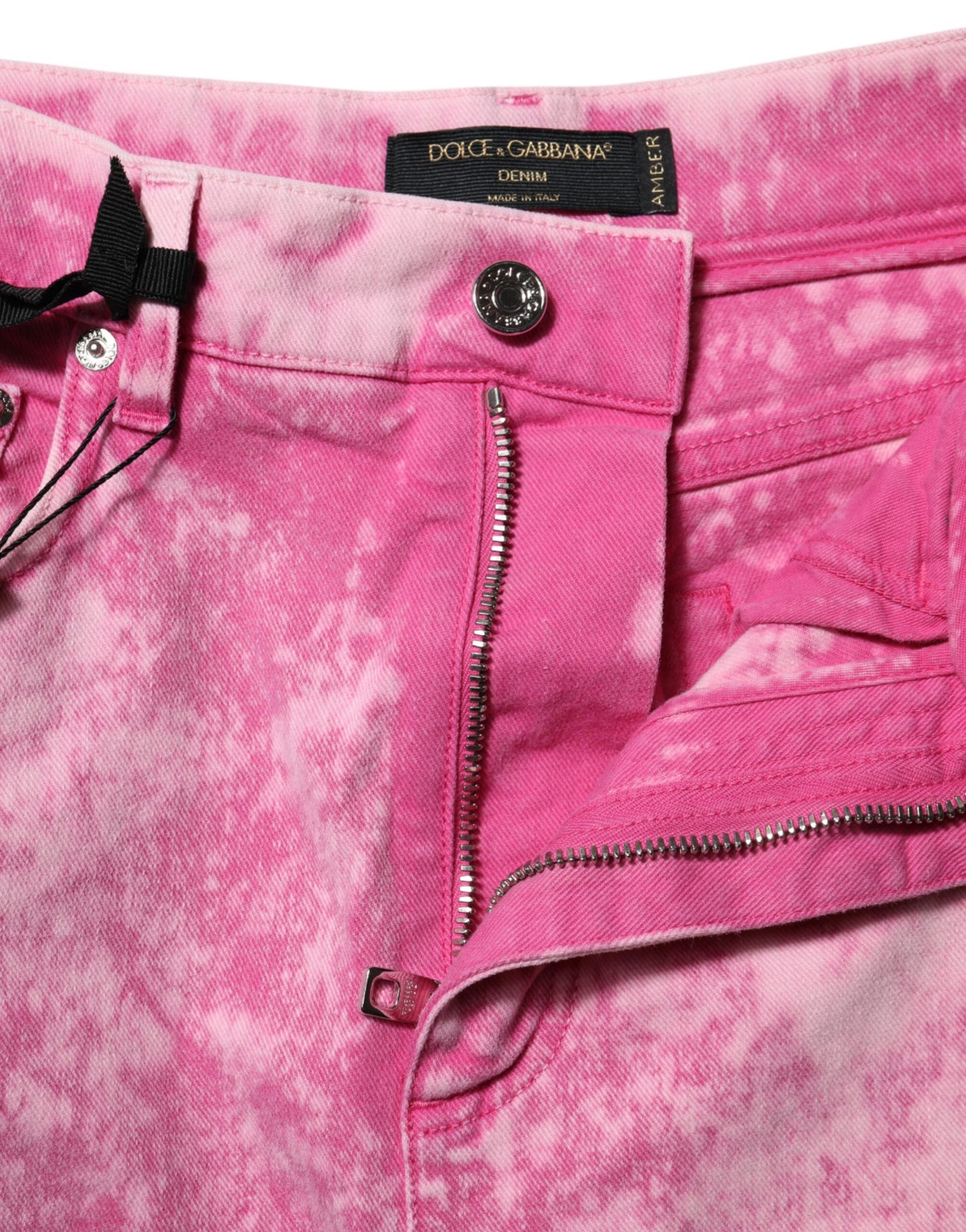 Vaqueros ajustados de cintura alta con efecto tie-dye en color rosa